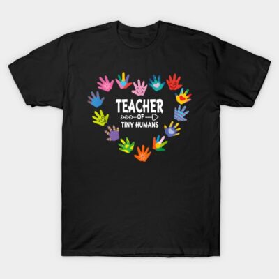 Black T-shirt with colorful handprints and "Teacher of Tiny Humans" text, ideal for educators.