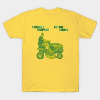 Yellow t-shirt featuring a graphic of a person on a lawnmower, text "Cuttin' Grass," casual cotton clothing.