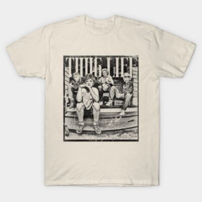 Cream graphic t-shirt with vintage "Thug Life" design, casual style, soft cotton material for comfortable wear.