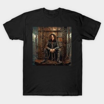 Black cotton t-shirt with artistic design featuring a person sitting on a swing with chains in a rustic setting.