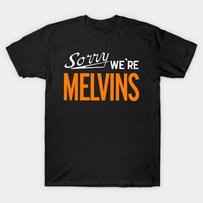 Black t-shirt with "Sorry We're Melvins" text in white and orange, casual unisex style, cotton material.