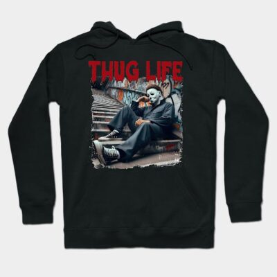 Black hoodie with "Thug Life" text, featuring urban graffiti design. Casual streetwear, perfect for everyday comfort.