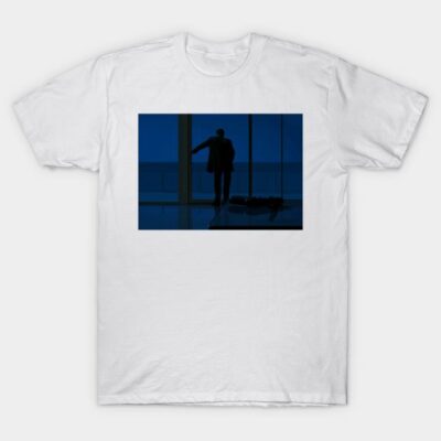 White T-shirt with silhouette graphic of a person at window, modern style, casual wear, soft cotton material.