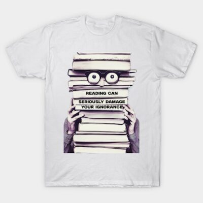 White t-shirt with book stack and glasses graphic, "Reading Can Seriously Damage Your Ignorance" text, casual wear.