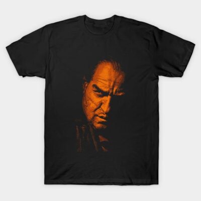 Black t-shirt with orange graphic design, casual wear, soft cotton material, suitable for everyday style.