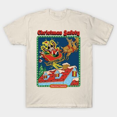 Cream Christmas Safety T-shirt with colorful cartoon print, featuring Santa, reindeer, and rooftop scene. Cotton casual wear.