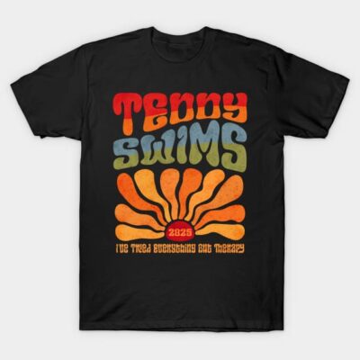 Black graphic T-shirt with retro colorful design, sunburst pattern, casual cotton tee for everyday wear.