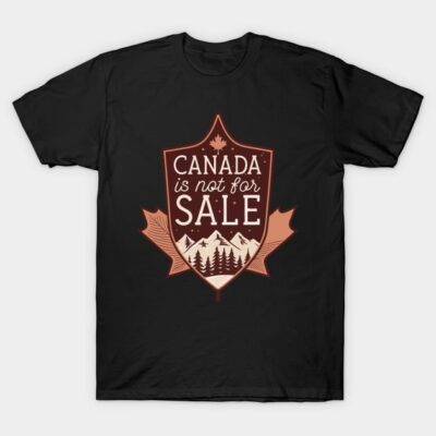 Black t-shirt with "Canada is Not for Sale" graphic, featuring mountains and leaves, casual cotton apparel.