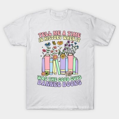 White t-shirt with colorful book and flower design, featuring text about history and banned books. Cotton, casual wear.