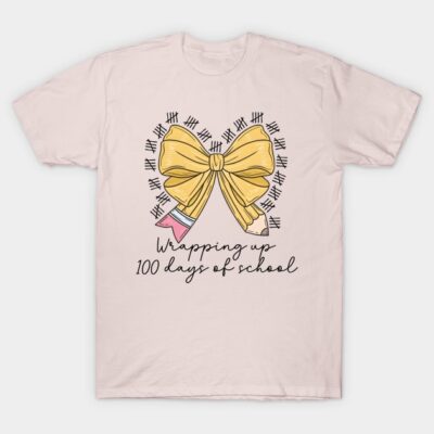 Pale pink t-shirt with "Wrapping up 100 days of school" design featuring a yellow bow and tally marks, casual style.