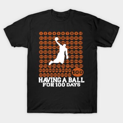 Black t-shirt with orange and white basketball player graphic and "Having a Ball for 100 Days" text design.