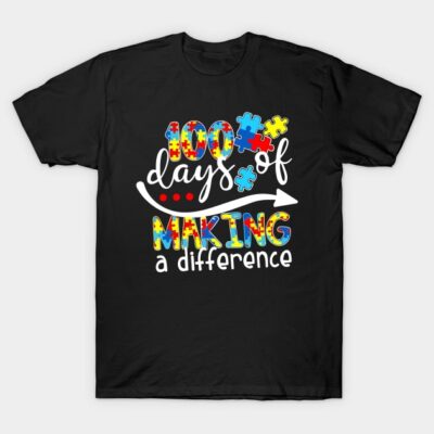 Black t-shirt with colorful "100 Days of Making a Difference" puzzle piece design, celebrating milestones.