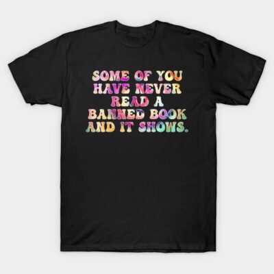 Black t-shirt with colorful text "Some of you have never read a banned book and it shows," casual style, cotton fabric.