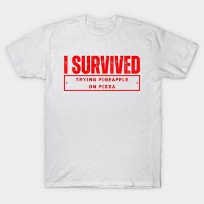 White novelty t-shirt with red text "I Survived Trying Pineapple On Pizza," casual style, cotton fabric.