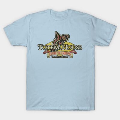 Light blue graphic t-shirt featuring Totem House Fish 'N Chips logo, casual style, soft fabric, unisex design.