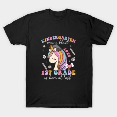 Black t-shirt with colorful unicorn and text design celebrating kindergarten and first-grade transition.