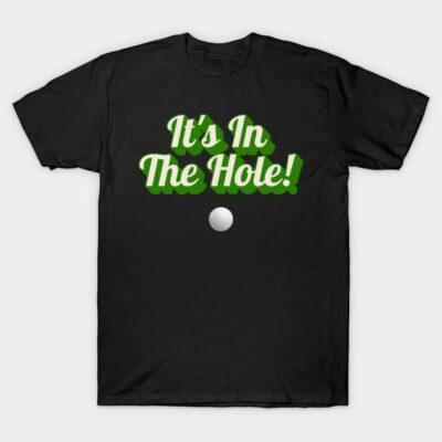 Black T-shirt with "It's In The Hole!" slogan and golf ball graphic, casual wear, cotton material, unisex design.