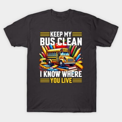 Black T-shirt with colorful school bus and pencils design, featuring "Keep My Bus Clean" slogan. 100% cotton casual wear.