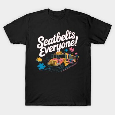 Black t-shirt with a colorful school bus and puzzle pieces graphic, featuring the text "Seatbelts Everyone!" in bold.