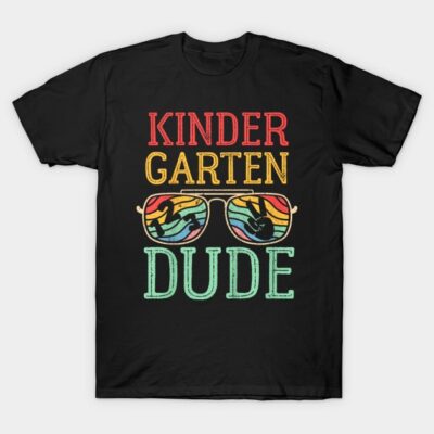 Black "Kindergarten Dude" T-shirt with colorful sunglasses graphic, casual style, perfect for kids' playful attire.