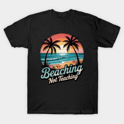 Black t-shirt with "Beaching Not Teaching" graphic, featuring a sunset beach scene with palm trees and ocean waves.