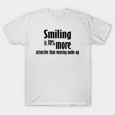 White t-shirt with bold black text print "Smiling is 70% more attractive than wearing make-up," casual style, cotton material.