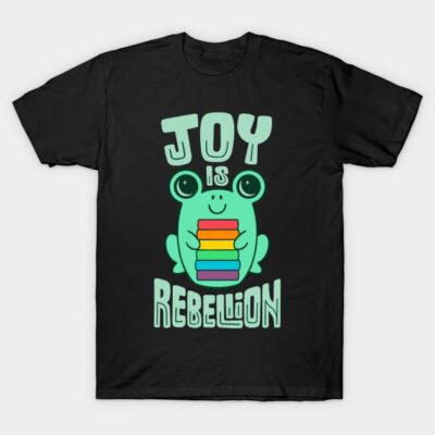Black t-shirt with "Joy is Rebellion" text and a cute frog holding rainbow blocks. Casual, fun design for everyday wear.
