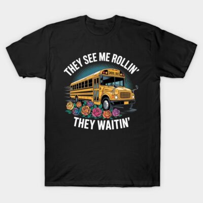 Black T-shirt with yellow school bus and colorful flowers graphic, featuring "They See Me Rollin' They Waitin'" text.
