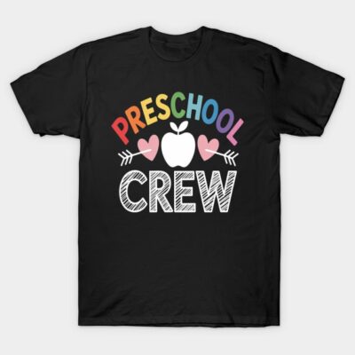 Black "Preschool Crew" graphic t-shirt with rainbow text, apple, and heart design, ideal for school events or casual wear.