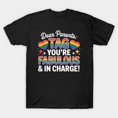 Black t-shirt with rainbow text "Dear Parents: Tag You're Fabulous & In Charge!" Fun casual wear.