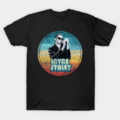 Black graphic T-shirt with retro-style design, featuring vibrant blue, orange, and yellow stripes.