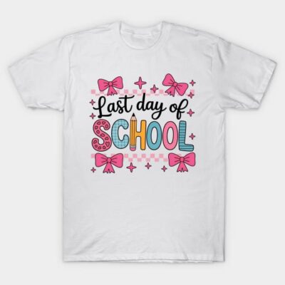 White t-shirt with colorful "Last Day of School" design, featuring pink bows and stars, perfect for school events.
