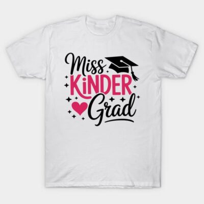 White "Miss Kinder Grad" T-shirt with black and pink lettering, featuring a graduation cap and heart design.