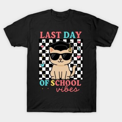 Black t-shirt with "Last Day of School Vibes" design featuring a cat in sunglasses and graduation cap, checkered background.