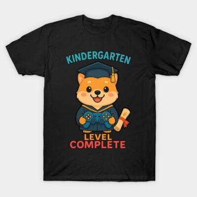 Black t-shirt with cute cartoon dog in graduation cap, "Kindergarten Level Complete" text, perfect for kids' celebration.