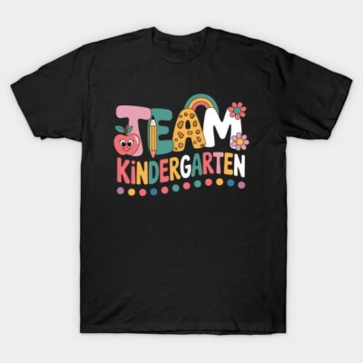 Black "Team Kindergarten" T-shirt with colorful playful design, featuring apple, pencil, and rainbow graphics.
