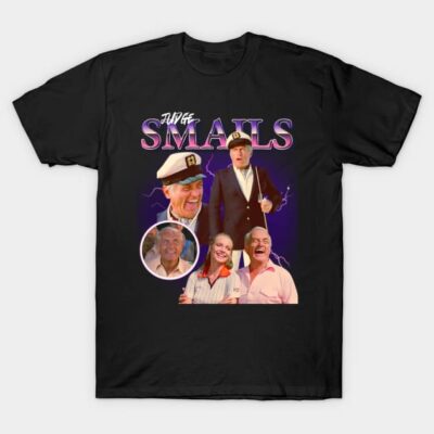 Black graphic T-shirt with retro movie collage design, featuring bold text and colorful character images, casual wear.