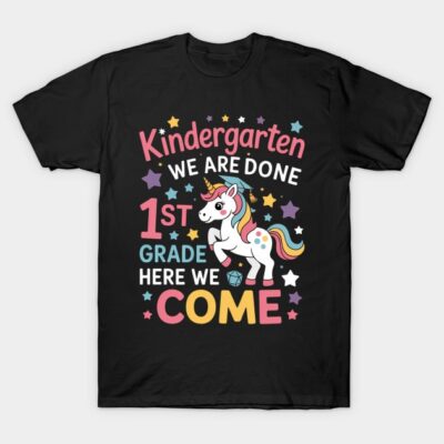Black t-shirt with colorful unicorn and text design celebrating kindergarten graduation to 1st grade.