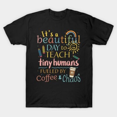 Black T-shirt with colorful teacher-themed text and graphics, perfect for educators. Casual style, cotton material.