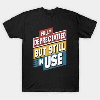 Black t-shirt with colorful text design reading "Fully Depreciated But Still in Use," casual cotton material.