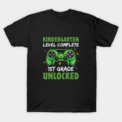 Black T-shirt with green game controller design, "Kindergarten Level Complete, 1st Grade Unlocked" text.
