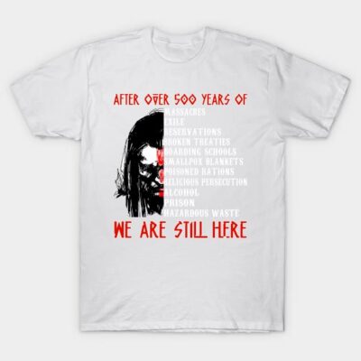 White graphic T-shirt with bold red and black text and illustration, highlighting resilience and historical themes.