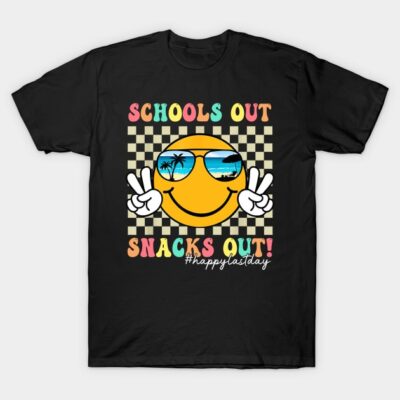 Black T-shirt with smiley face design, "Schools Out Snacks Out" text, checkered background, casual summer wear.