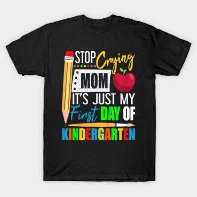 Black t-shirt with colorful "First Day of Kindergarten" design featuring pencil, apple, and playful fonts.
