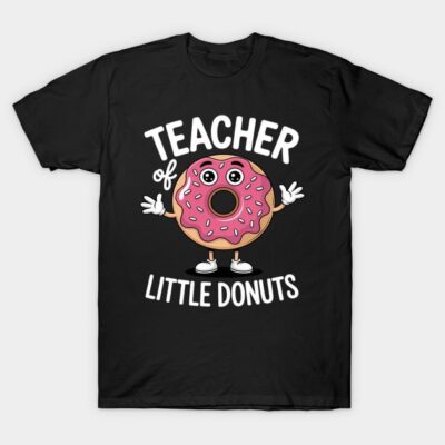 Black t-shirt with "Teacher of Little Donuts" graphic, featuring a cartoon donut character with pink icing.