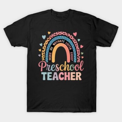 Black T-shirt with colorful "Preschool Teacher" text and rainbow heart design, ideal for educators, cotton material.