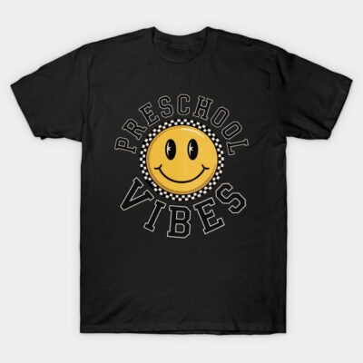 Black t-shirt with "Preschool Vibes" text and yellow smiley face graphic, casual cotton wear for kids.