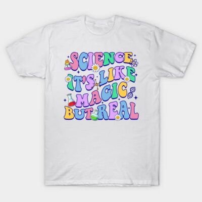White science-themed graphic T-shirt with colorful "Science It's Like Magic But Real" text design, casual wear.