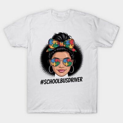 White T-shirt with colorful puzzle design, "#SCHOOLBUSDRIVER" text, ideal for casual wear, cotton material.