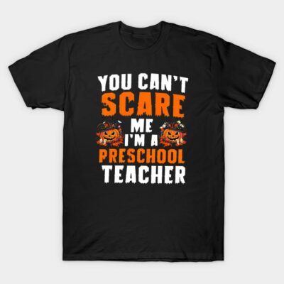 Black Halloween-themed t-shirt with "You Can't Scare Me I'm a Preschool Teacher" text and pumpkin graphics.